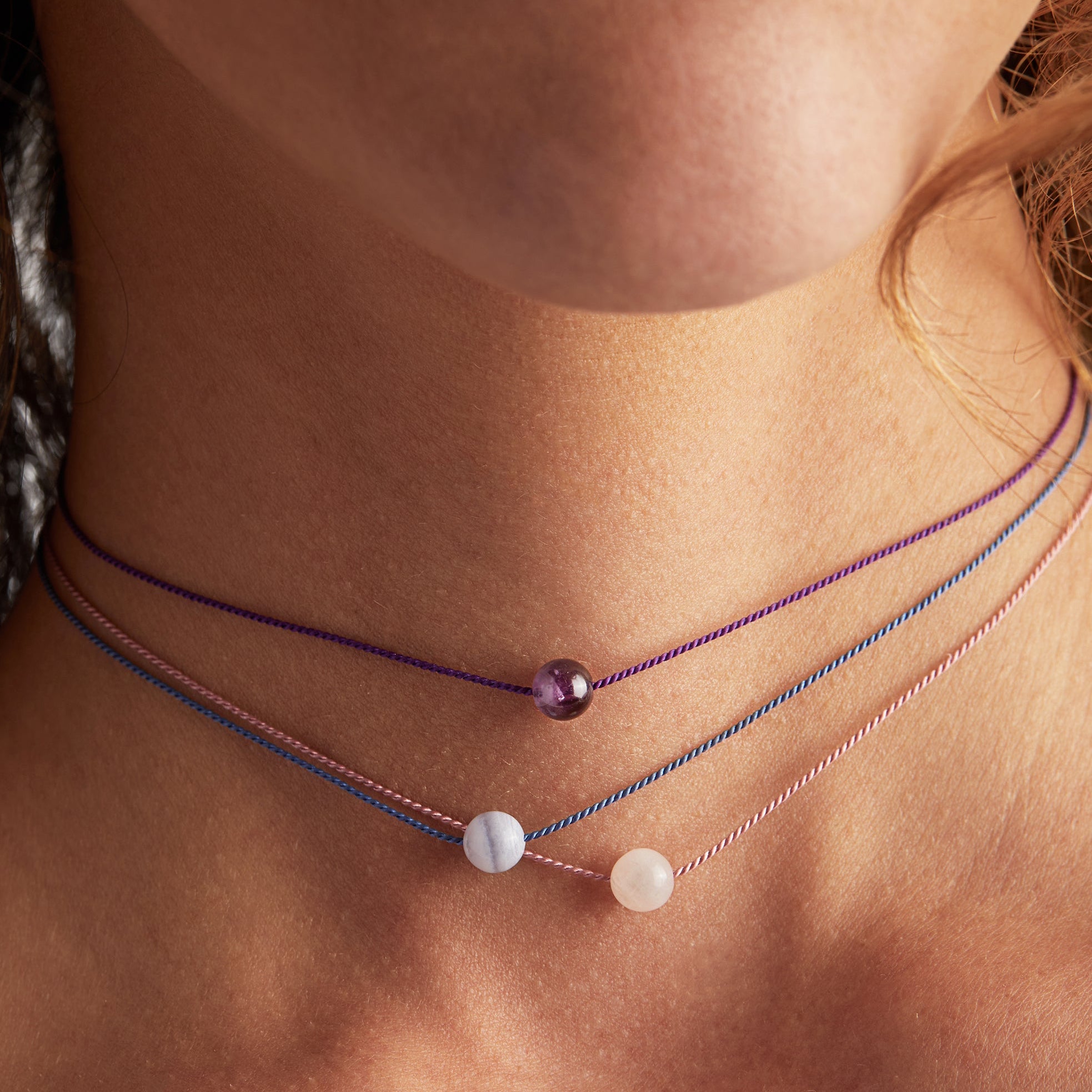 blue-lace-agate-gemstone-cord-necklace-on-model-AA670622SG-04.jpg